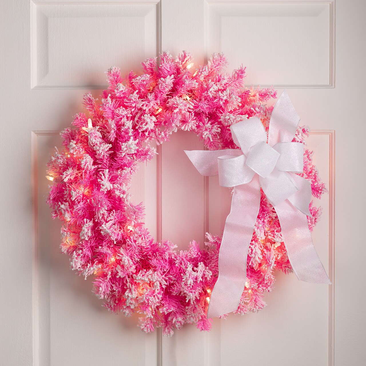 Northlight Pre-Lit Flocked Pine Artificial Christmas Wreath - 24" - Pink - Clear Lights